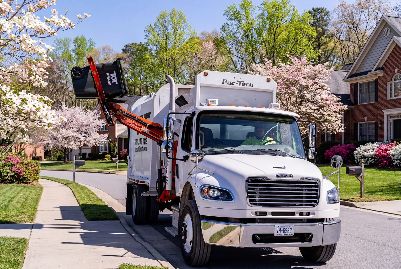 Tons of Trash delivery truck on a residential route